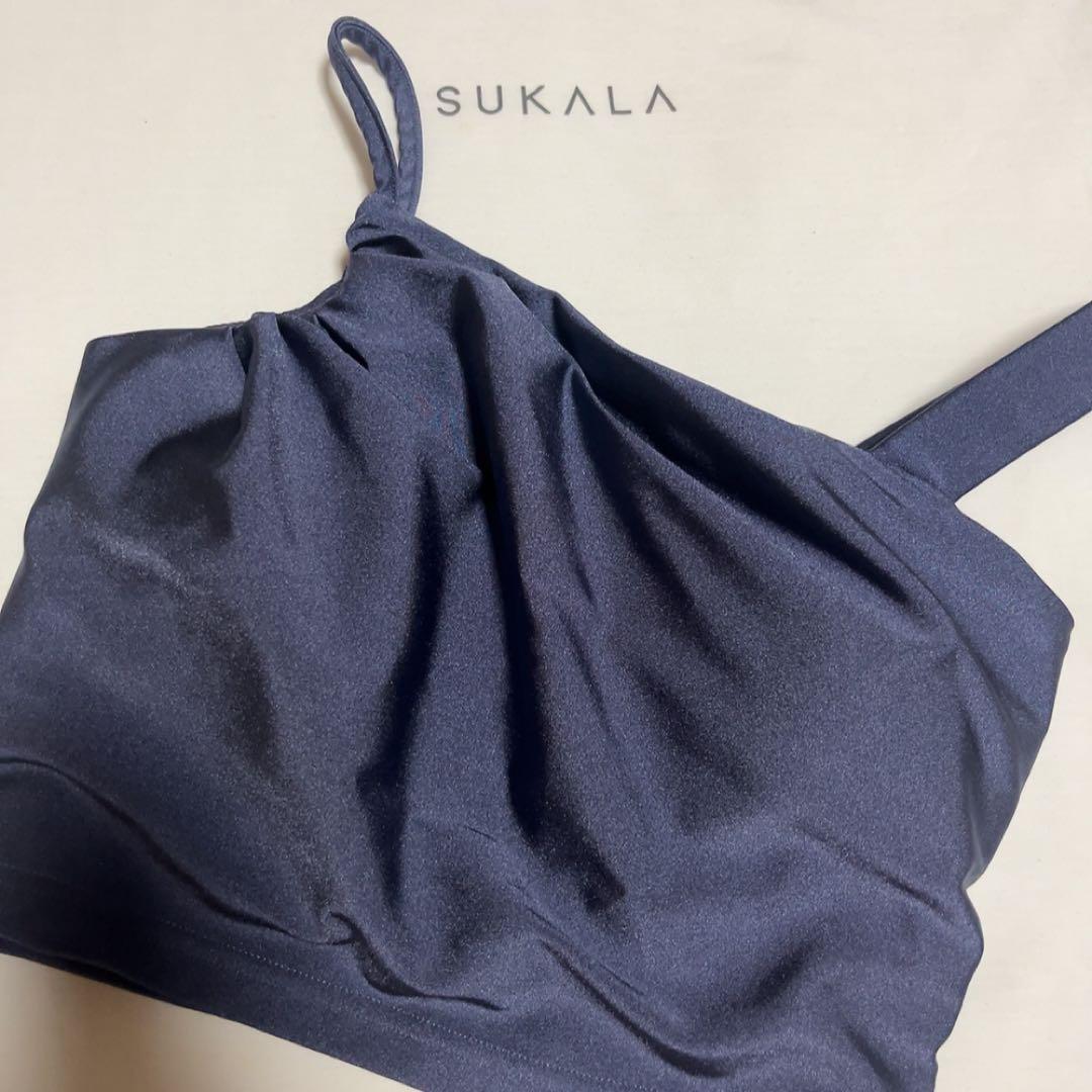 SUKALA シャインストレッチアシンメトリー トップス