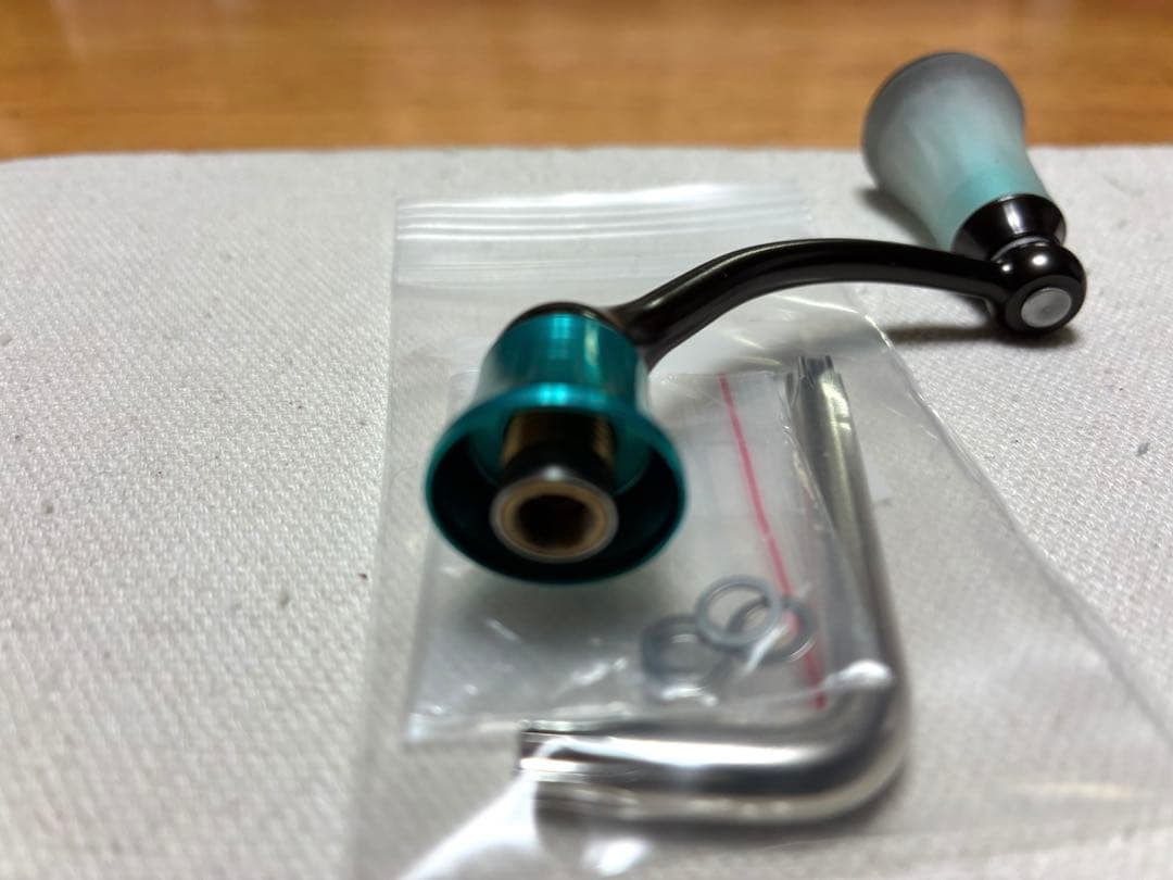 【未使用品】ダイワ スピニングリール 純正シングルハンドル【21EME AIR】