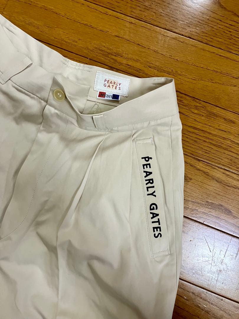 新品未使用。PEARLY GATES パーリーゲイツ タック入りパンツ