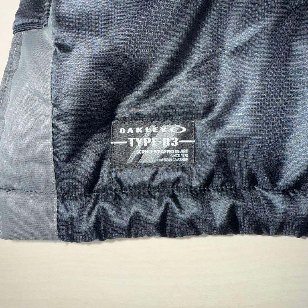 最終値下げ　美品　OAKLEY ベンチコート背面刺繍ビッグサイズ　バッグロゴ　金