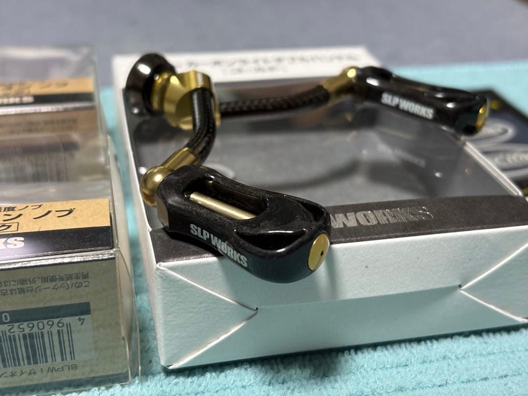ダイワSLP WORKS カーボンライトダブルハンドル 82mm ゴールド