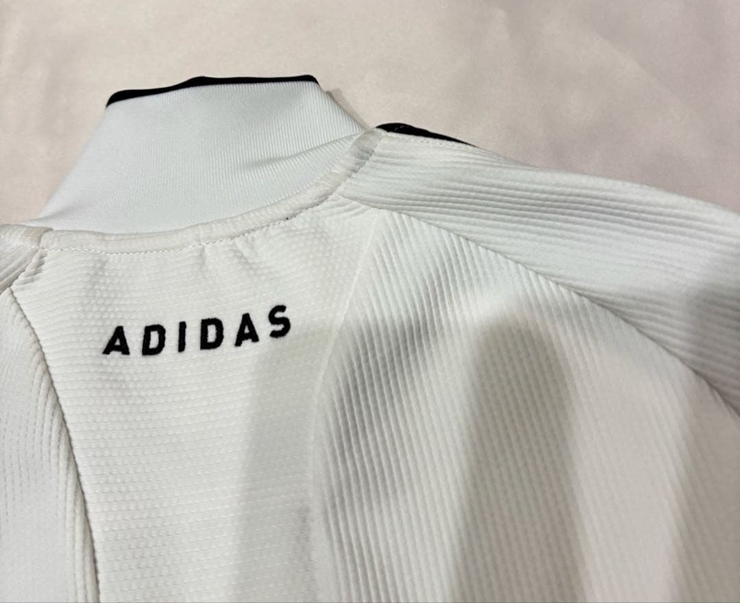 新品adidasゴルフ　スリーストライプストラックジャケット　パンチングスカート