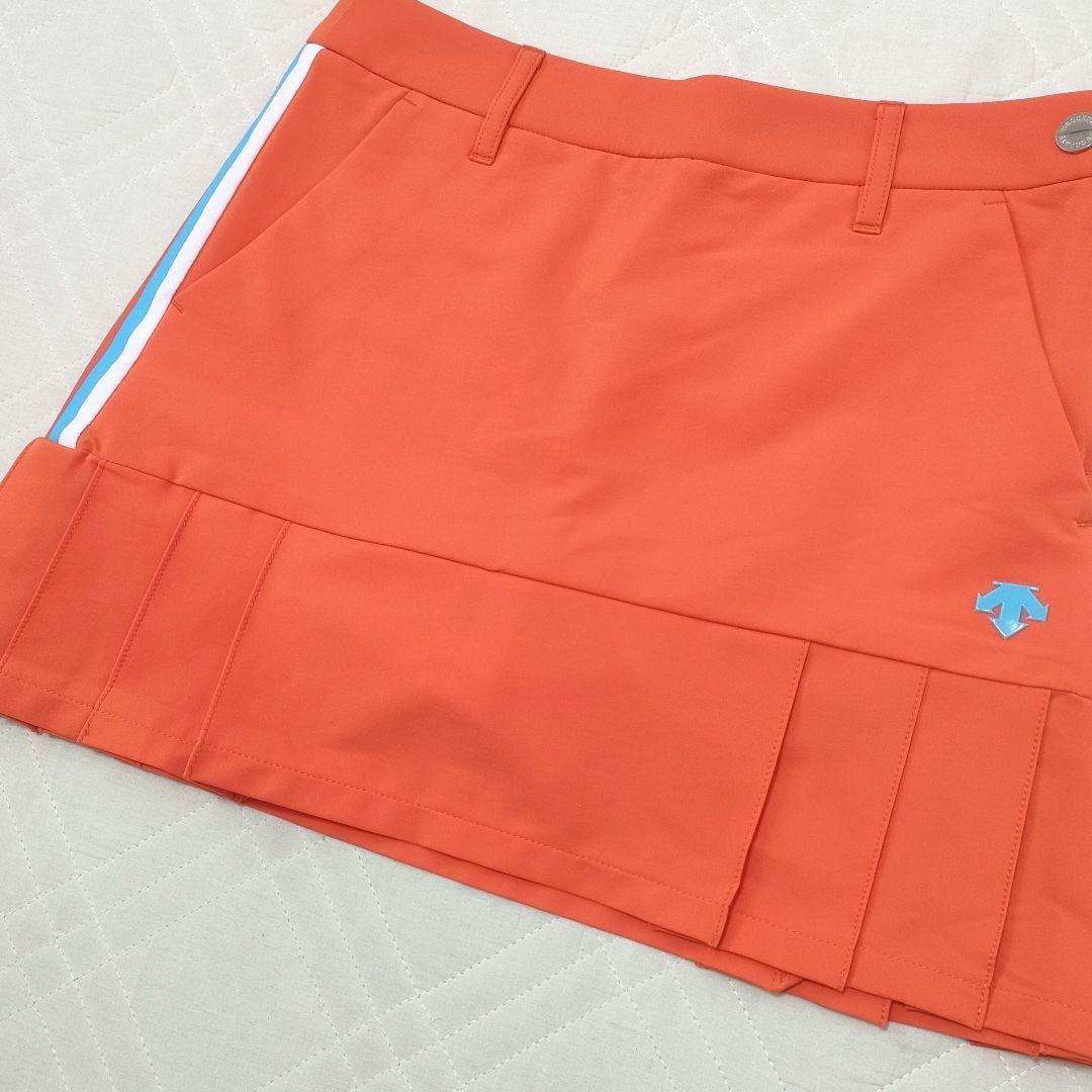 デサントゴルフ　セットアップ　モックネック半袖　スカート　プリーツ　オレンジ　S