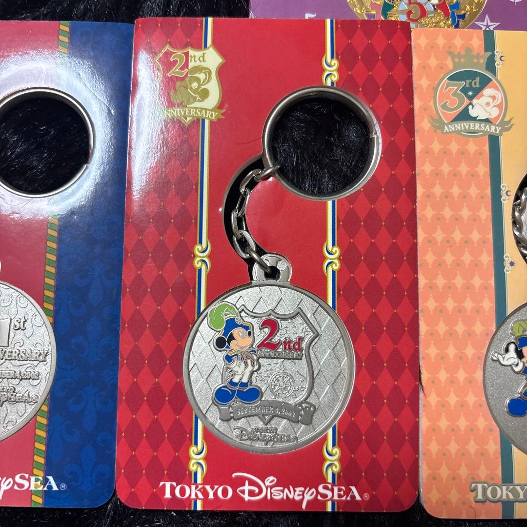 東京ディズニーシー 周年記念メダルキーホルダー 5個セット
