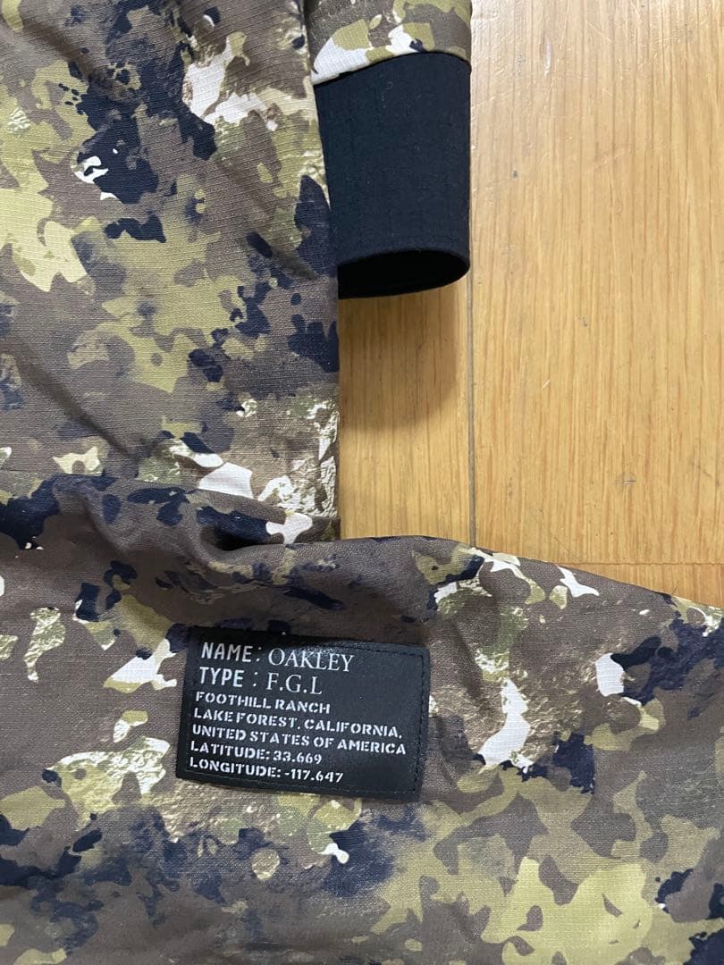 OAKLEYオークリー ゴルフジャケット メンズL 迷彩 防風 軽量 アウター