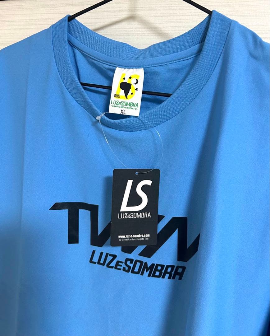 LUZeSOMBRAルースイソンブラ TWMプラクティスシャツ XL水色サックス