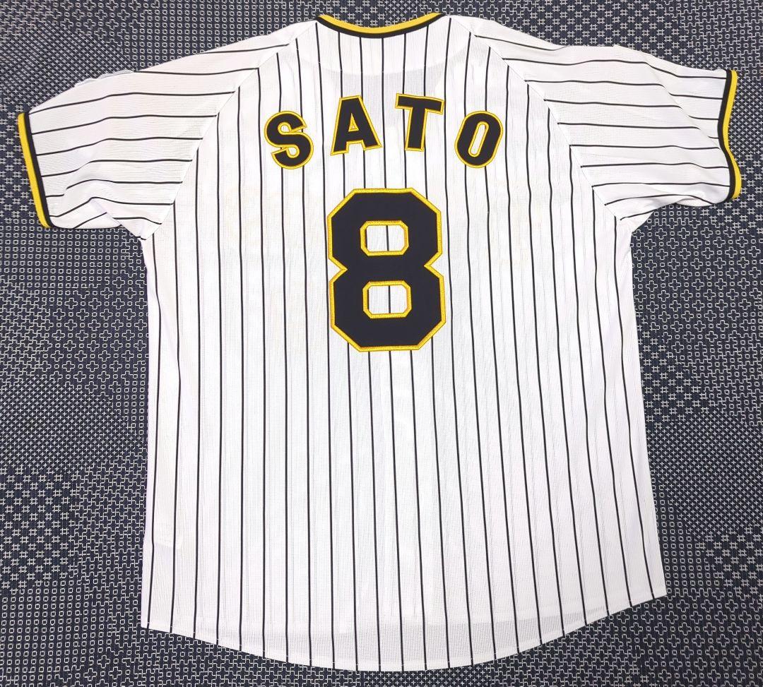 阪神タイガース　チャンピオン　エンブレム付き　ユニフォーム　佐藤輝明【Ｌサイズ】