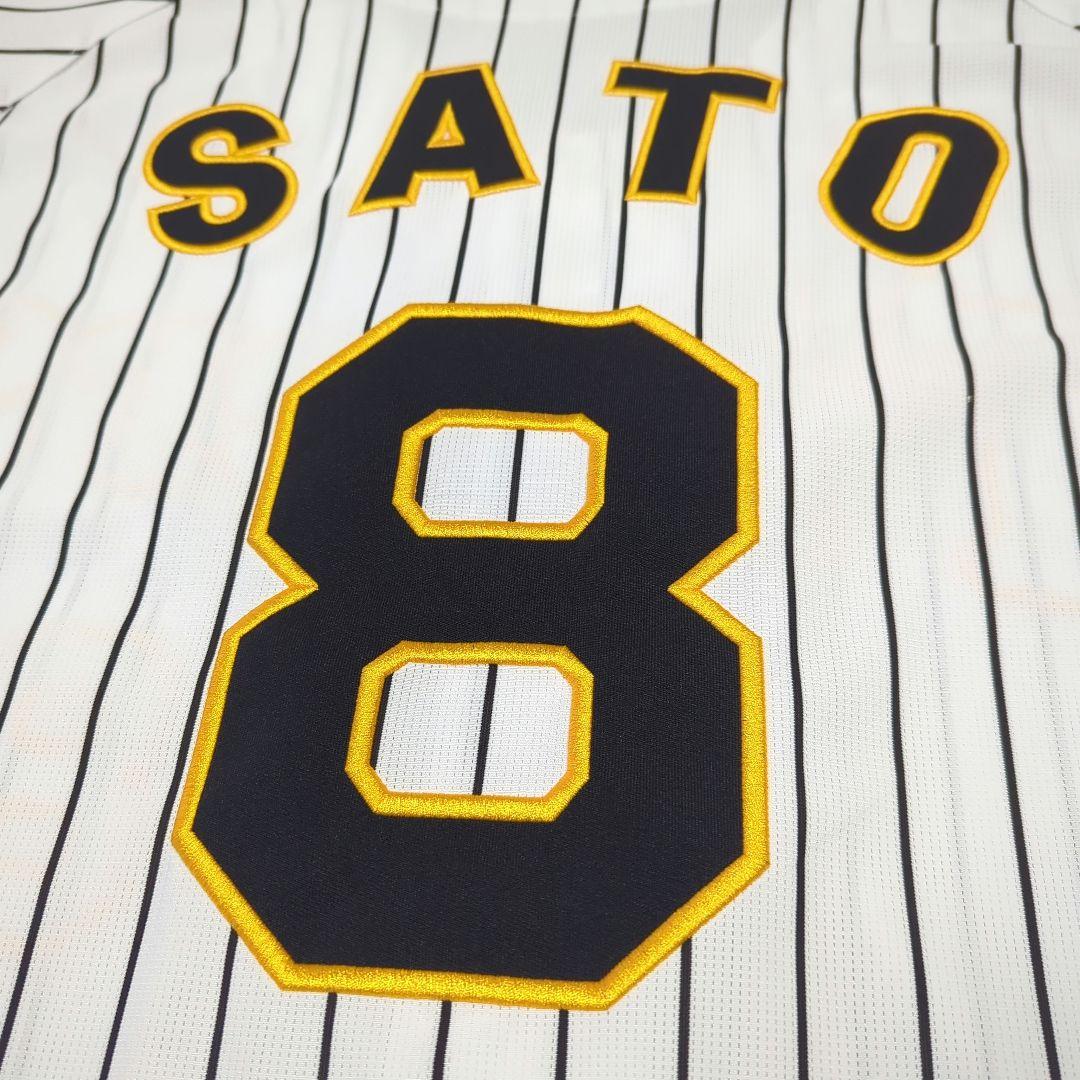 阪神タイガース　チャンピオン　エンブレム付き　ユニフォーム　佐藤輝明【Ｌサイズ】