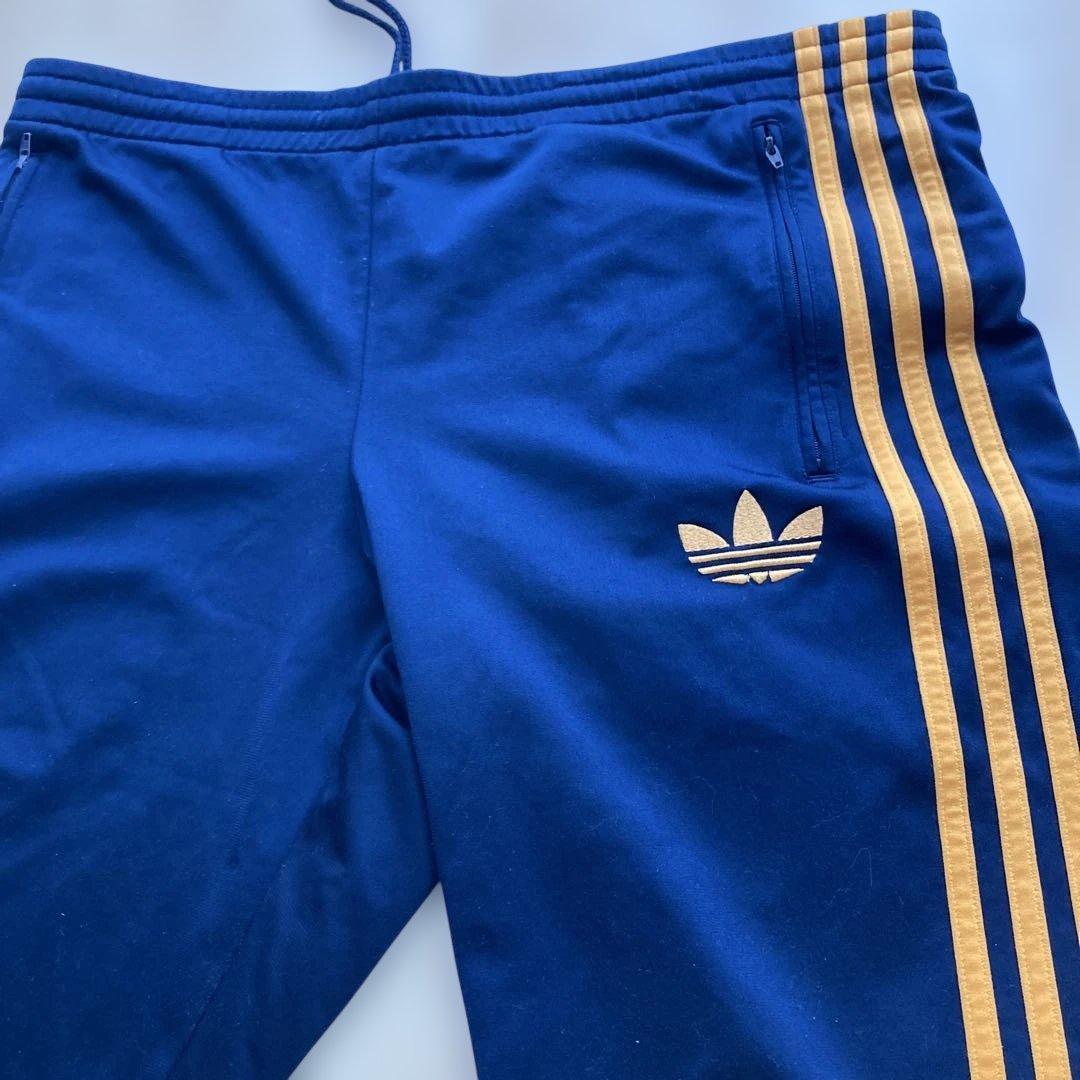 希少カラーオレンジGOLDトレフォイル×adidasオリジナルストラックパンツL