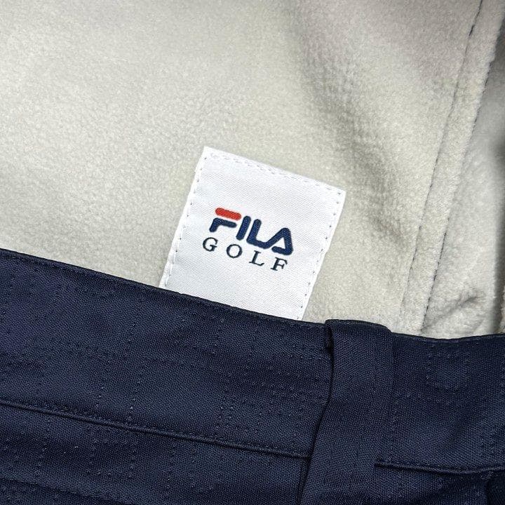 新品 フィラ ゴルフ 高周波キルト 3層ボンディング パンツ フリース 紺 90