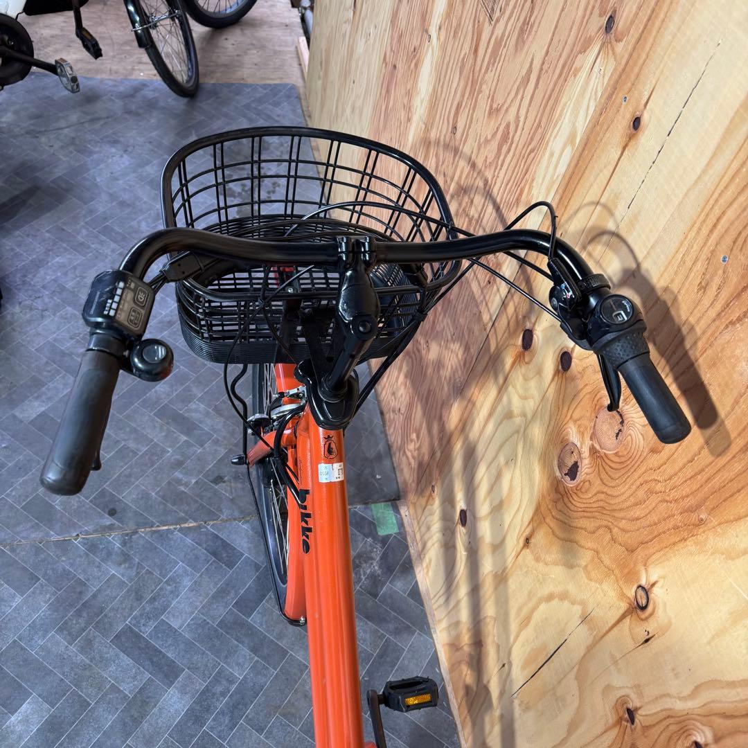 オレンジ色 電動アシスト自転車 シティタイプ