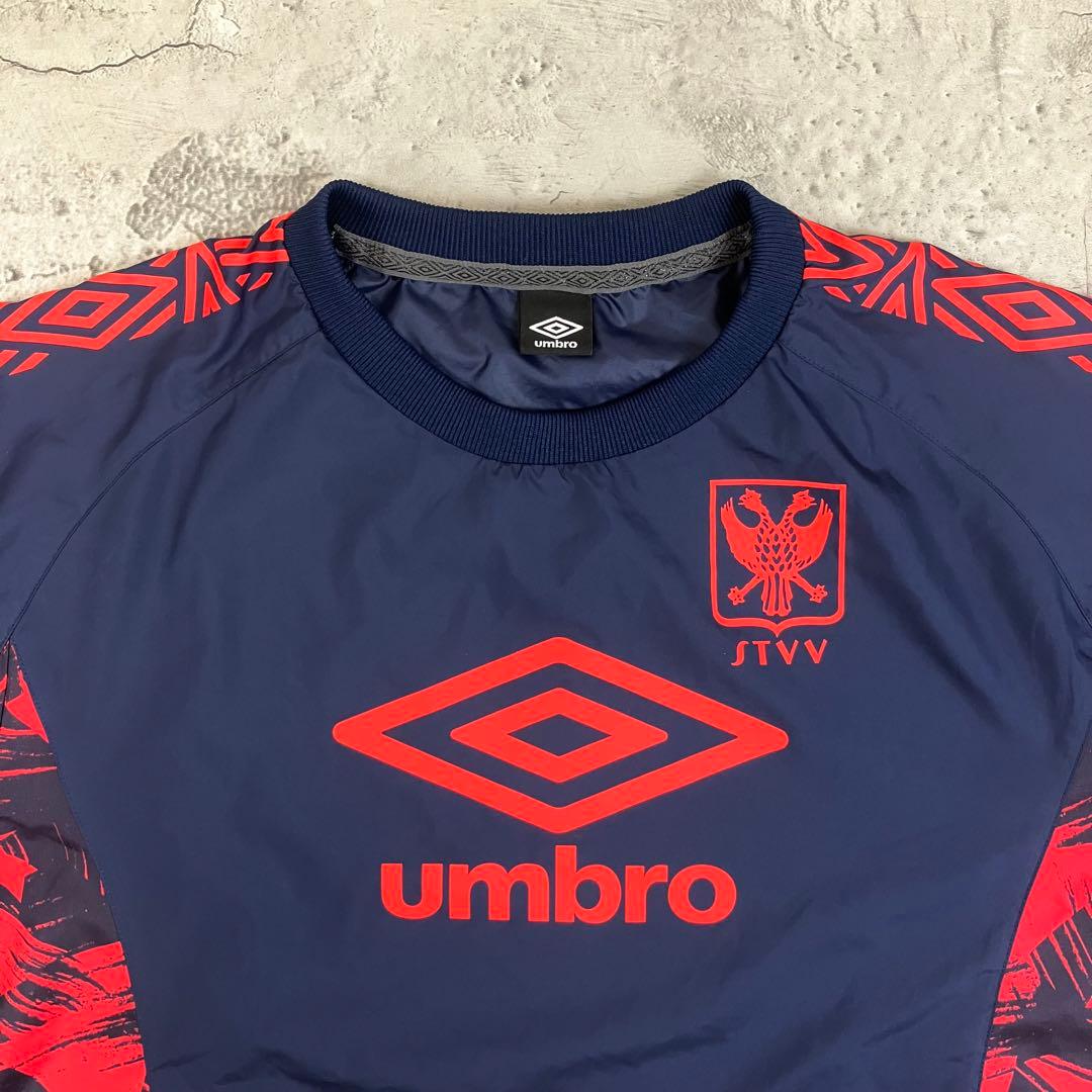 シントトロイデン STVV 長袖ピステトップ アンブロ 古着 ロゴ 紺 2XL